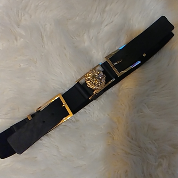 Black belt with gold lion emblem. - Picture 1 of 3